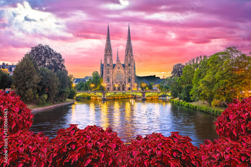 Obraz na płótnie Saint Paul church in Strasbourg canal reflection sunset view w salonie