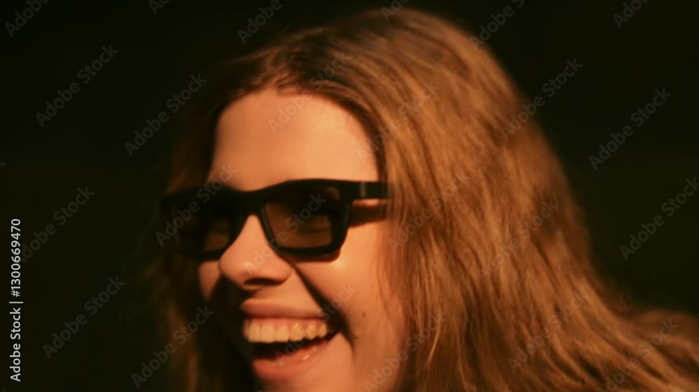 Smiling woman enjoys a moment of joy in a cozy setting at night Smiling woman enjoys a moment of joy in a cozy setting at night