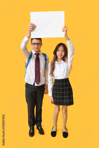 Schoolchildren holding blan...
