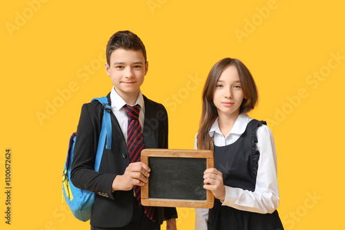 Schoolchildren holding blan...