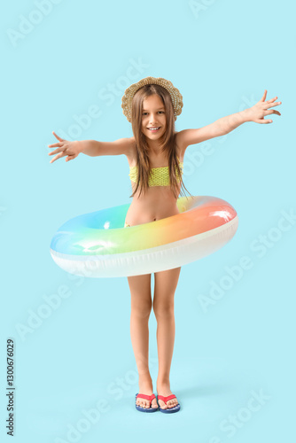 Cute little girl in swimsui...