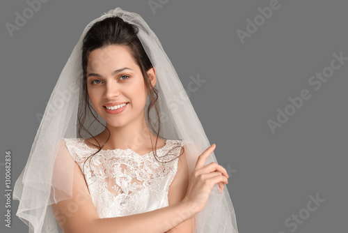 Young bride in wedding dres...
