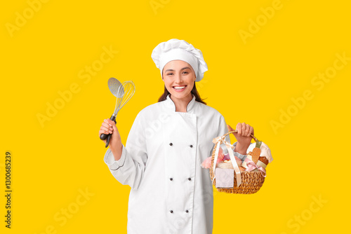 Happy female chef with East...