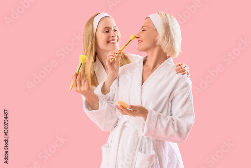 Happy young woman and her m...
