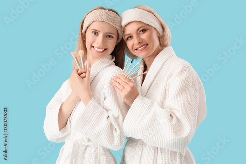 Happy young woman and her m...