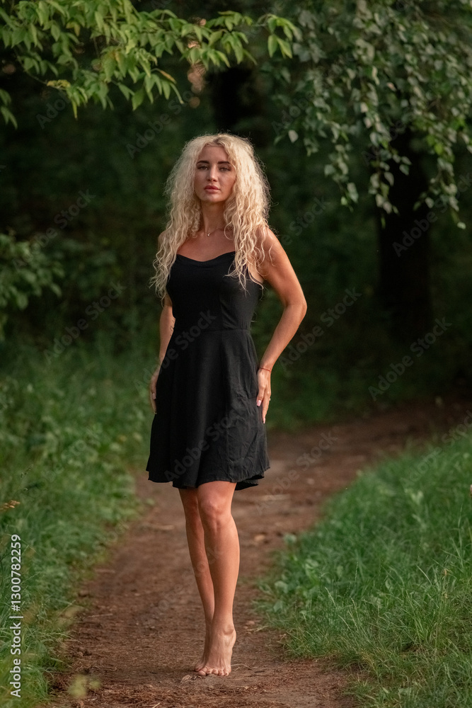 Portrait of a young beautiful blonde girl in nature. Portrait of a young beautiful blonde girl in nature.