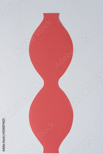 Fotografie abstract paper shape with wave contour or hourglass form on blank paper