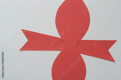 Cuadro en lienzo abstract paper shape with wavy contour or hourglass form and ribbons with v-shap