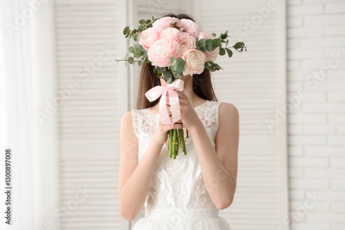 Young woman in wedding dres...