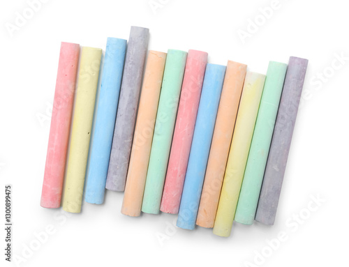 Row of colorful chalks on white background