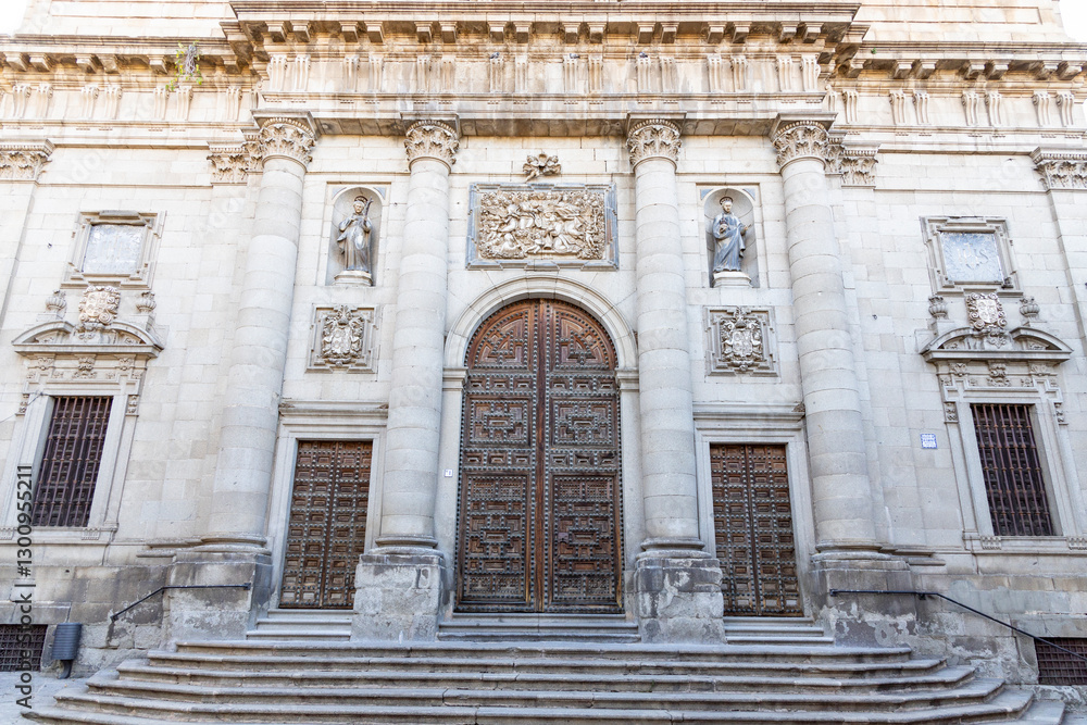 Fototapeta premium Historic wooden doors of Toledo, Spain, from grand religious entrances to charming home façades. Masterfully crafted with intricate carvings, iron details, and unique designs,Spain’s rich heritage.