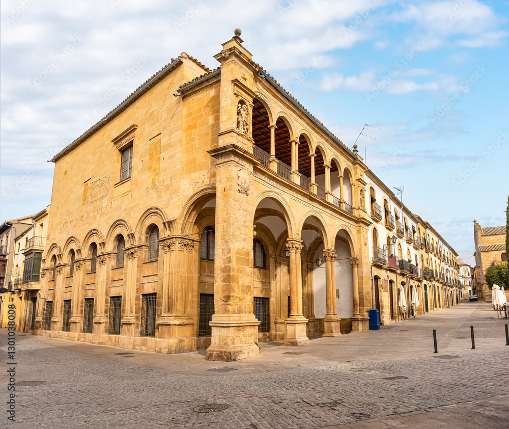 Fototapeta premium Old town hall of the city of Ubeda with medieval-style stone arches, Jaen