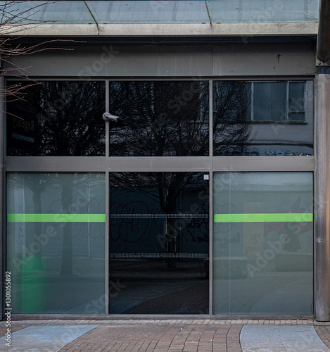 Closed and empty shops in a shopping centre depicting the dying UK high street.