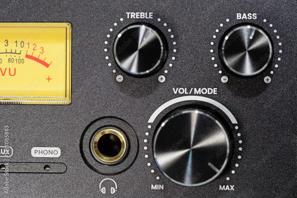 Volume control on a sound amplifier. Adjusting bass and treble. Volume control on a sound amplifier. Adjusting bass and treble.