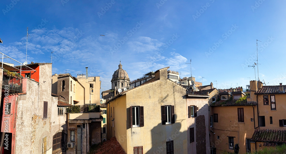 Facade of a historic tenement house in the center of the old town. Rome, Italy. Facade of a historic tenement house in the center of the old town. Rome, Italy.