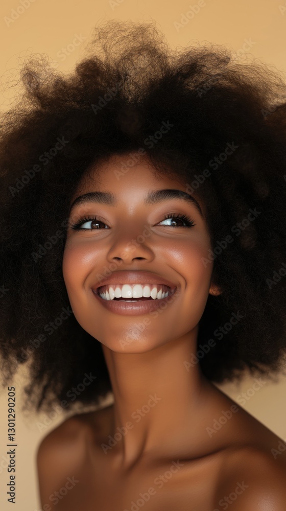 High-resolution studio portrait of young African woman with radiant smile High-resolution studio portrait of young African woman with radiant smile
