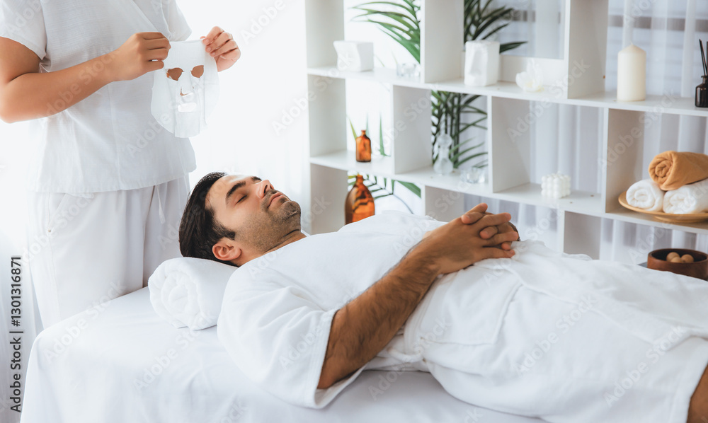 Obraz premium Serene modern daylight ambiance of spa salon, woman customer indulges in rejuvenating with facial skincare mask. Facial skin treatment and beauty cosmetology procedure for face. Quiescent