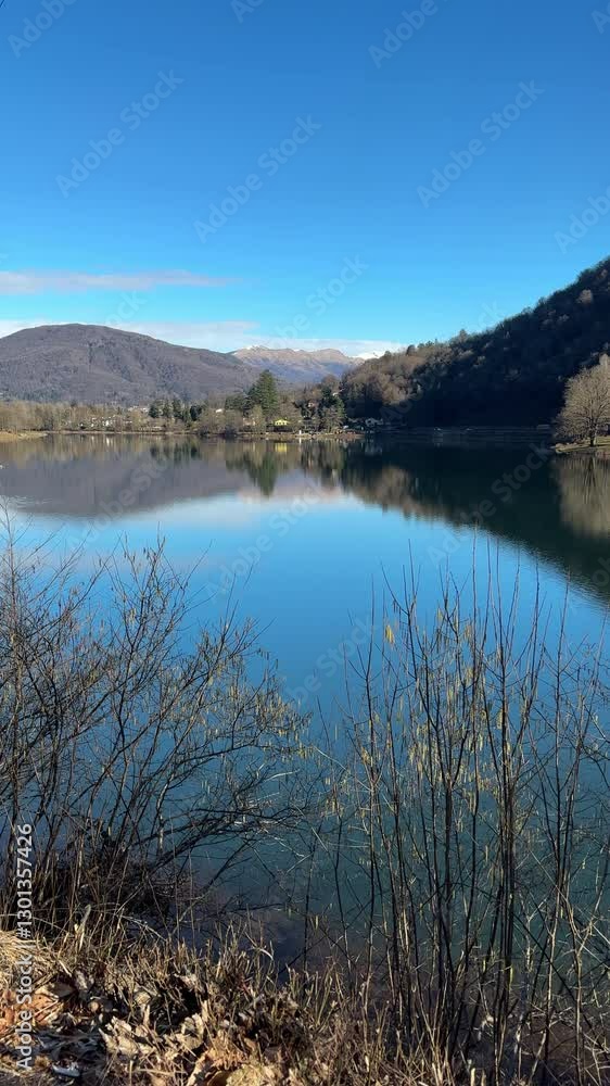 Lake Ghirla Landscape on a Sunny Day, Valganna, Province of Varese, Lombardy, Italy Lake Ghirla Landscape on a Sunny Day, Valganna, Province of Varese, Lombardy, Italy
