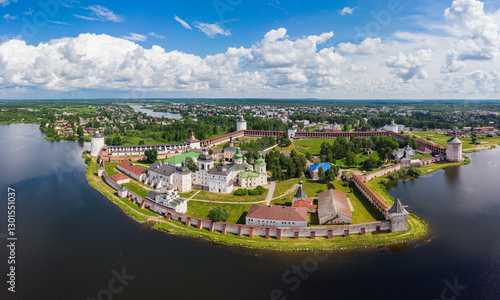 Aerial top view of ancient Kirillo Belozersky Monastery, fortress and lake Siverskoye on sunny summer day. Panoramic view to Church of the Transfiguration. Holy places, Kirillov, Vologda region Russia