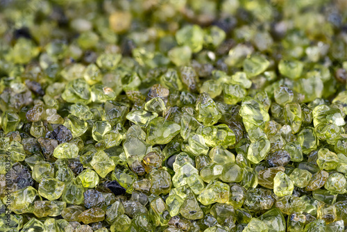 gravel chips Polished olivine (aka Peridot) close-up detail
