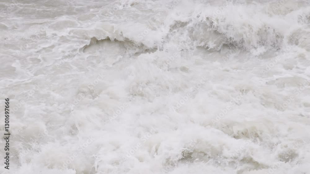 muddy seething water in slow motion, closeup full-frame background muddy seething water in slow motion, closeup full-frame background