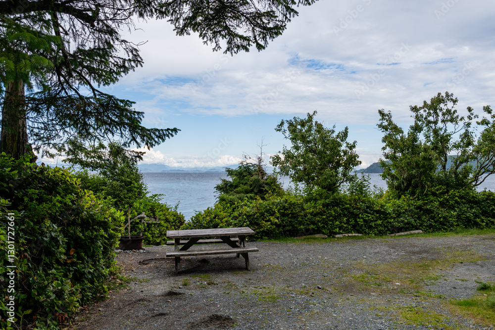 picnic table place on camping site on the shore of the Queen Charlotte Strait on an Malcolm island picnic table place on camping site on the shore of the Queen Charlotte Strait on an Malcolm island