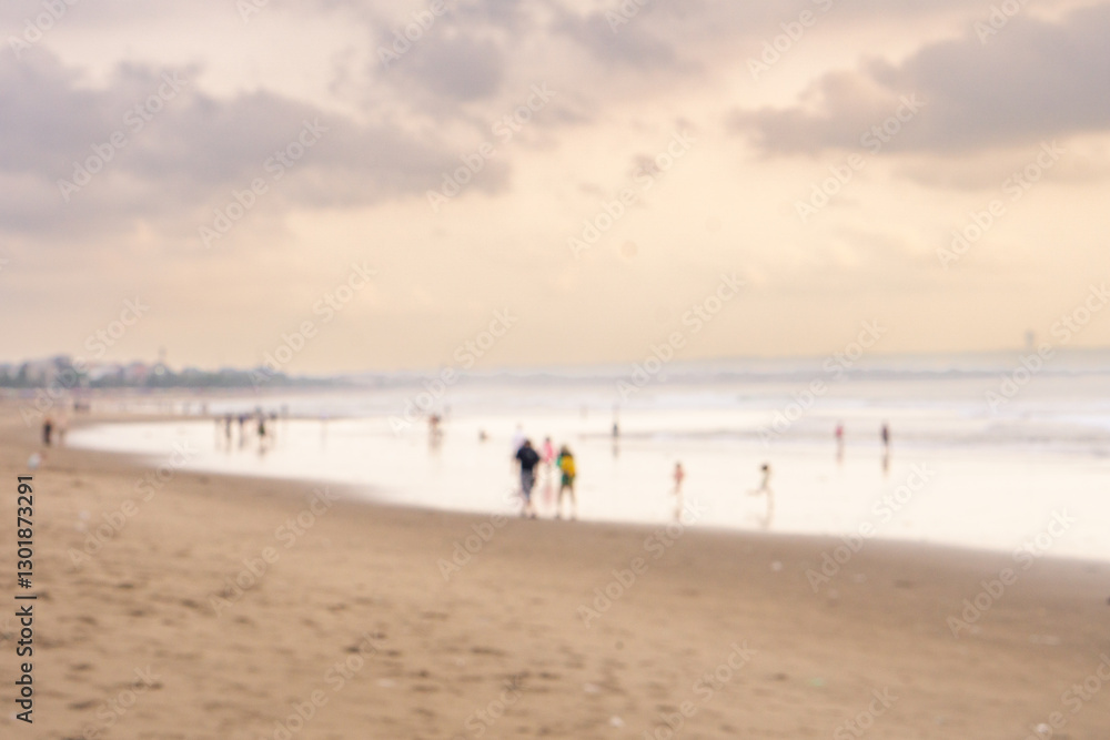 Blurry background of people at beach with cloudy at sunset Blurry background of people at beach with cloudy at sunset