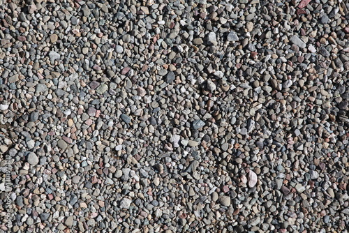 Pea gravel background texture, gray