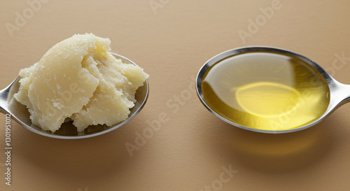 Close-up of spoonfuls of beef tallow and seed oil