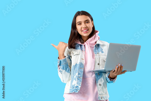 Beautiful young woman in st...