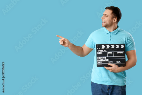 Happy young man with clappe...