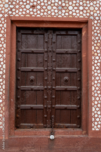 Agra   India - 2 January 2025 Old indian traditional wooden lock closed door at Agra  Uttar Pradesh  India Asia  South Asia
