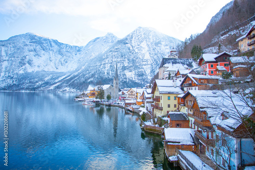 townscape in hallstatt, austria with the reflection of lake