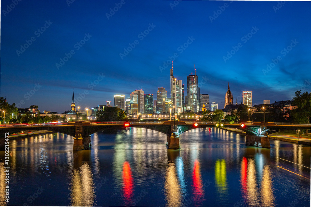 Frankfurt is the only skyline in Germany. Backlit for the sunset with a great sky and lighting in the houses. High-Rise Buildings, City Recording and Financing Frankfurt is the only skyline in Germany. Backlit for the sunset with a great sky and lighting in the houses. High-Rise Buildings, City Recording and Financing