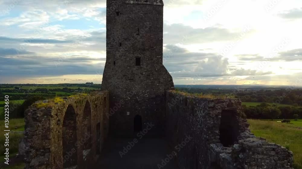 Aerial view of the church ruins in Skryne, County Meath, Ireland, structure among green hills Aerial view of the church ruins in Skryne, County Meath, Ireland, structure among green hills