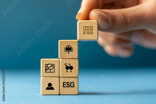 Wooden blocks with text ESG and icons representing the environment