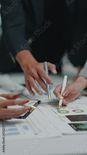 Close up of hand teamwork business group are meeting working and brainstorming about business financial and marketing on paperwork and presentation.