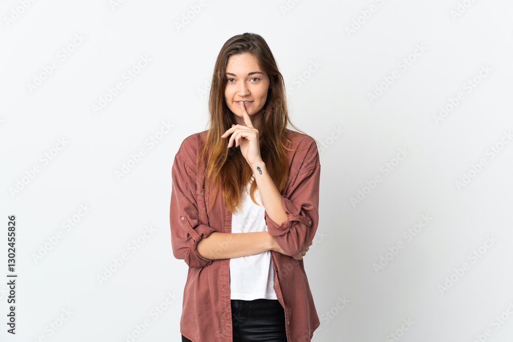 Young Ireland woman isolated on white background showing a sign of silence gesture putting finger in mouth Young Ireland woman isolated on white background showing a sign of silence gesture putting finger in mouth