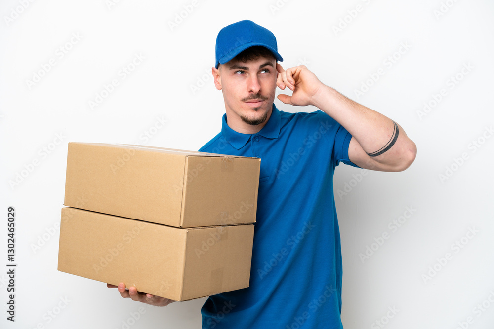 Delivery caucasian man isolated on white background having doubts and thinking Delivery caucasian man isolated on white background having doubts and thinking
