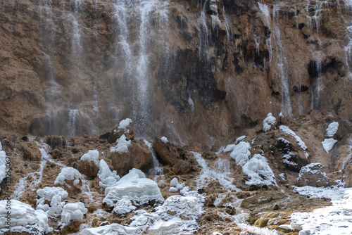 Obraz na płótnie Pearl Shoal Waterfall in winter season, is a waterfall located in Jiuzhaigou, Sichuan Province, China, steam, cascade w salonie