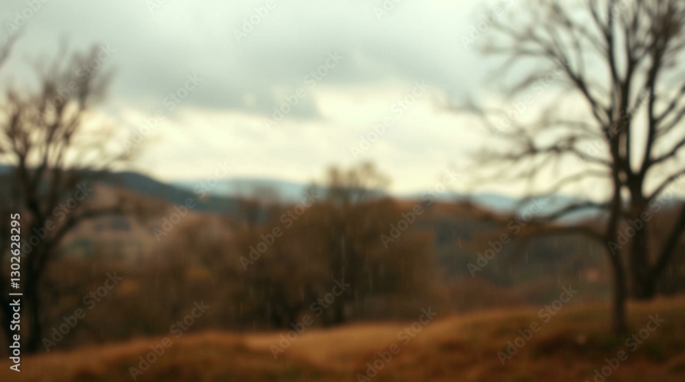 Abstract blur of a wet road surrounded by trees with a gloomy atmosphere, perfect for moody or introspective themes. Abstract blur of a wet road surrounded by trees with a gloomy atmosphere, perfect for moody or introspective themes.