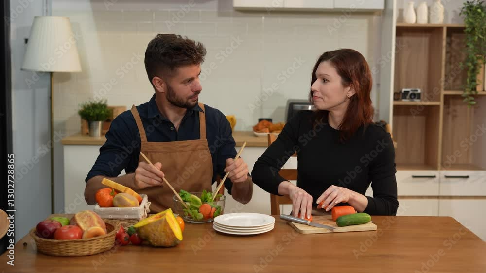 Happy couple preparing healthy meals with fresh vegetables and fruits in the kitchen. Perfect lifestyle concept for wellness, healthy eating, and home cooking themes. Happy couple preparing healthy meals with fresh vegetables and fruits in the kitchen. Perfect lifestyle concept for wellness, healthy eating, and home cooking themes.
