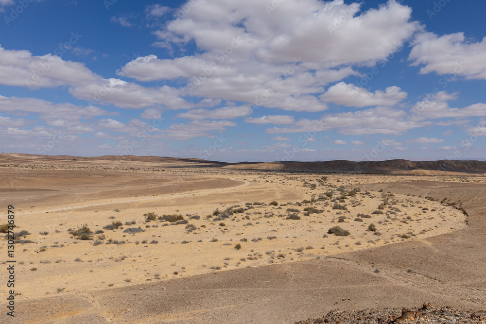 travel through the sandy desert, blue sky and many clouds travel through the sandy desert, blue sky and many clouds