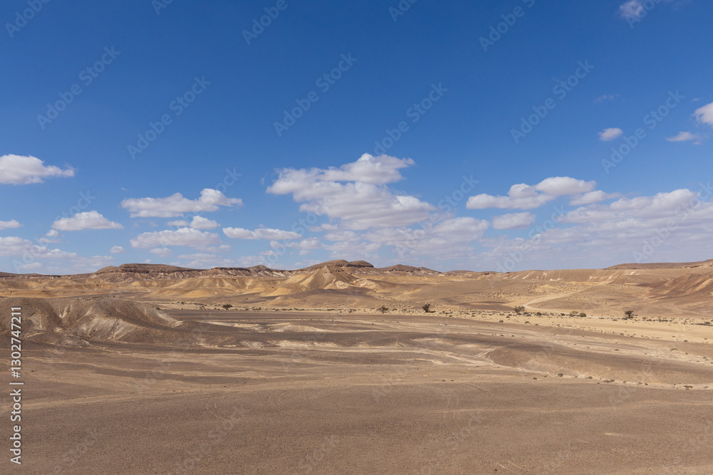 travel through the sandy desert, blue sky and many clouds travel through the sandy desert, blue sky and many clouds