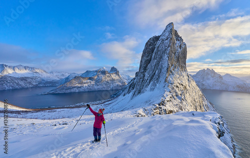 Woman  hiking in winter up ...