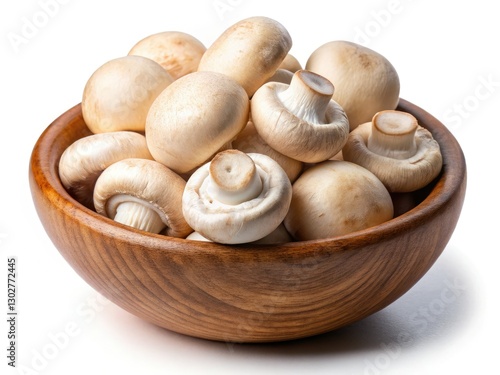 High-resolution image: a bowl brimming with creamy-white champignon mushrooms, ready for culinary creation.