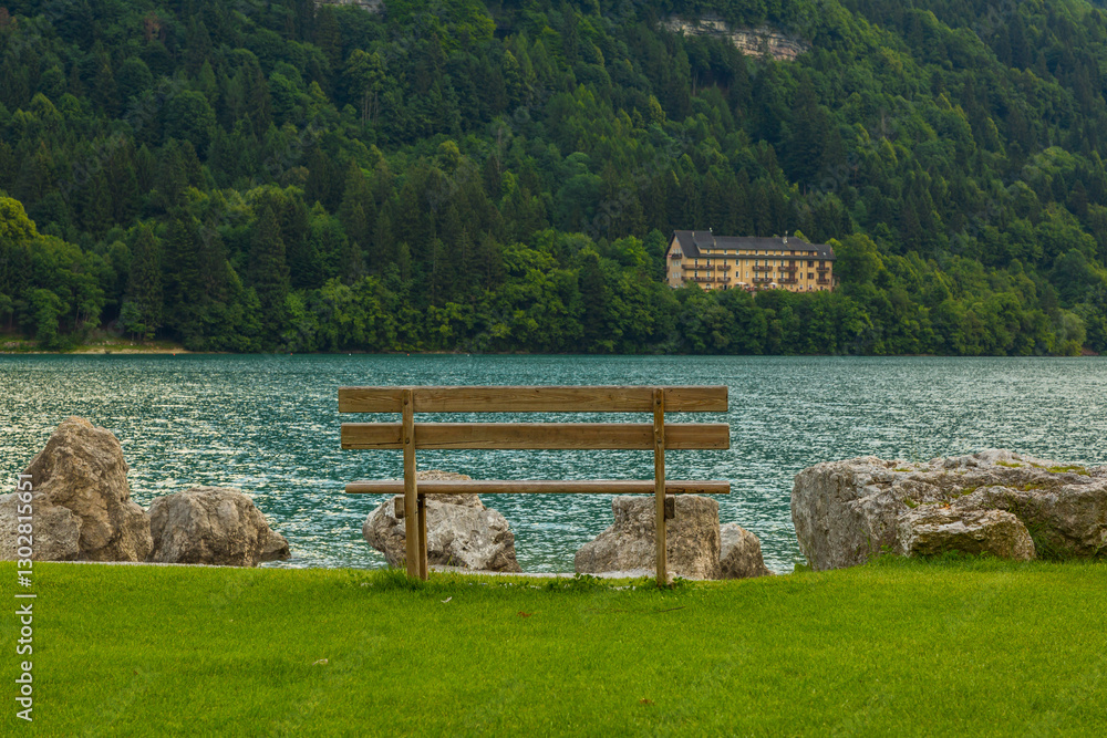Obraz premium Beautiful traditional summer view in Molveno, Trentino Alto Adige, Italy, scenic village, lake, and mountain landscape
