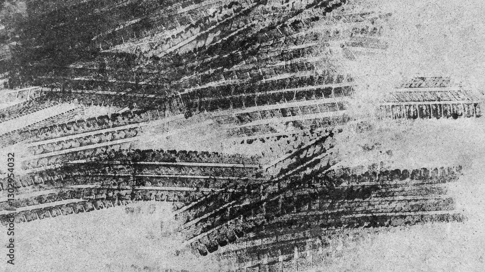 Black tire marks on road, Black rubber tire marks and tread marks, Tire trace track wheels texture and background, Auto tire tread grunge, Car wheel tyre tread track black tyre print, Top view.