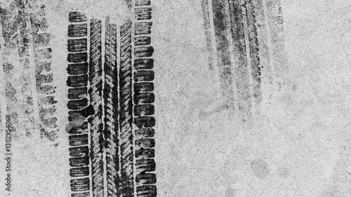 Obraz na płótnie Black tire marks on road, Black rubber tire marks and tread marks, Tire trace track wheels texture and background, Auto tire tread grunge, Car wheel tyre tread track black tyre print, Top view. w salonie