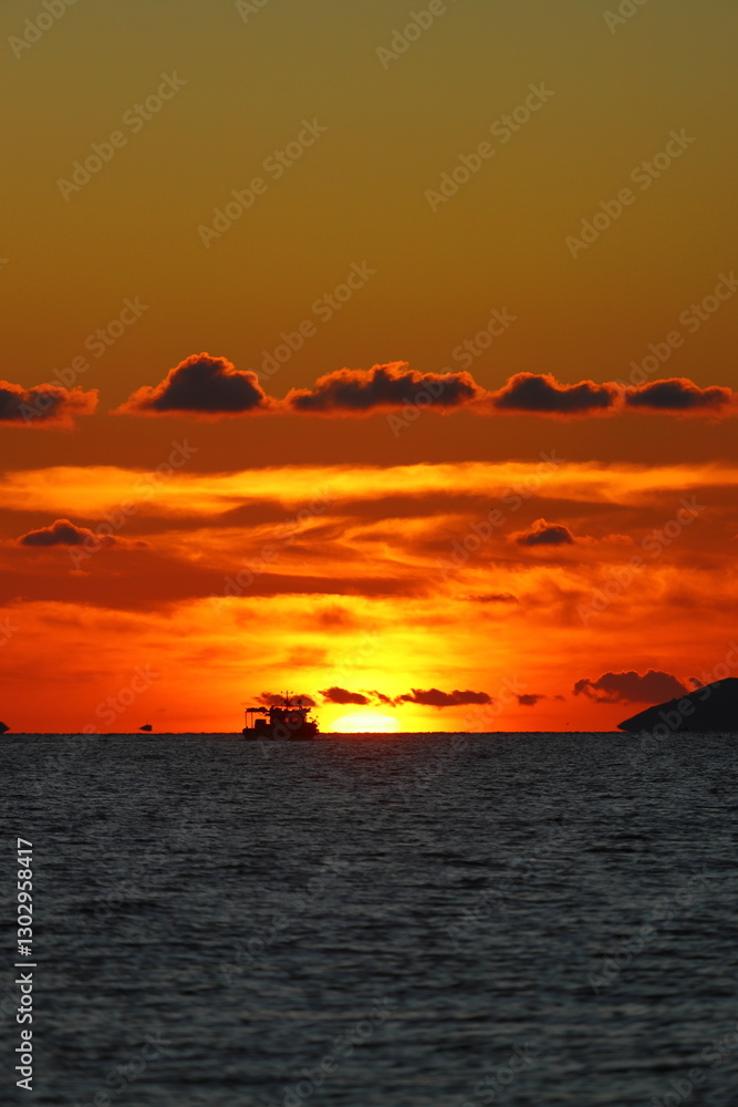 Close-up of empty sky and sun for copy space. The spectacular view of the sunset was breathtaking, with the sun sinking behind the clouds on the horizon. Close-up of empty sky and sun for copy space. The spectacular view of the sunset was breathtaking, with the sun sinking behind the clouds on the horizon.